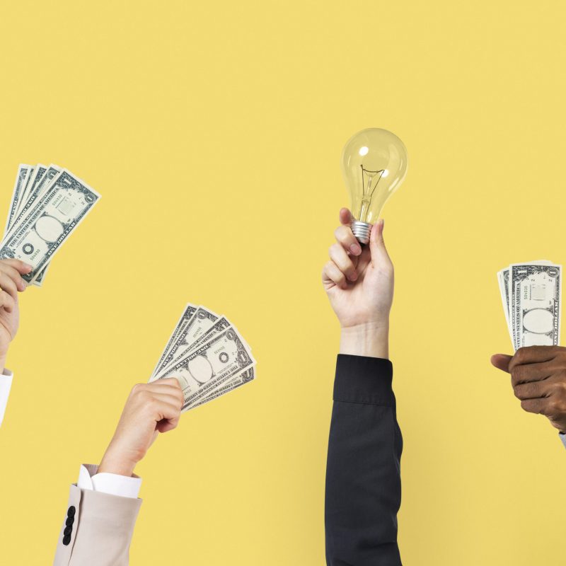 Business proposal bidding hands holding money